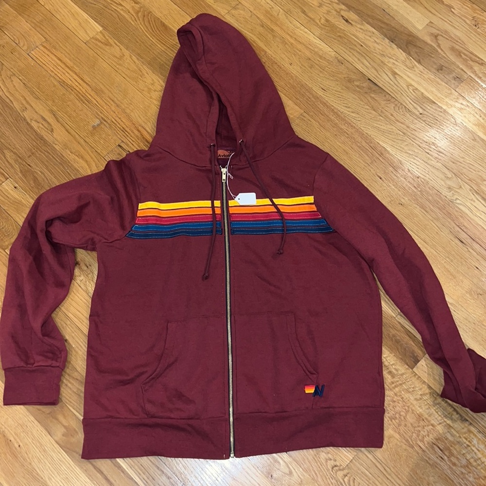 Aviator nation unisex zipup hoodie.  Bought it and never wore it.